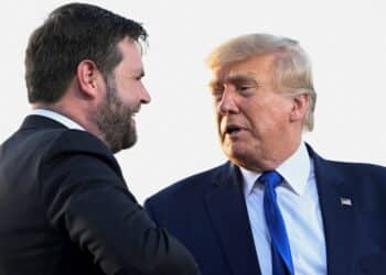 FILE PHOTO: U.S. Senate Republican candidate J.D. Vance, who was endorsed by former U.S. President Donald Trump for the upcoming primary elections, shakes hands with Trump during an event hosted by him, at the county fairgrounds in Delaware, Ohio, U.S., April 23, 2022. REUTERS/Gaelen Morse/File Photo