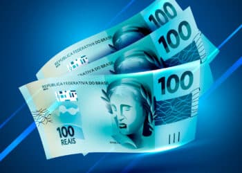 Salário Mínimo para 2025 em cédulas de 100 reais. (Fonte: freepik).