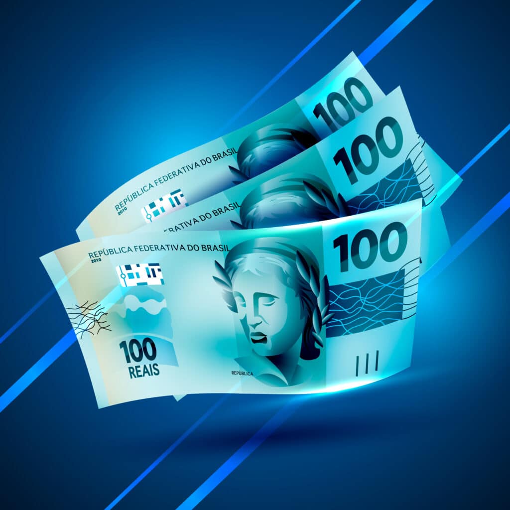 Pagamento do 14º salário do INSS em notas de 100 reais. (Fonte: freepik).